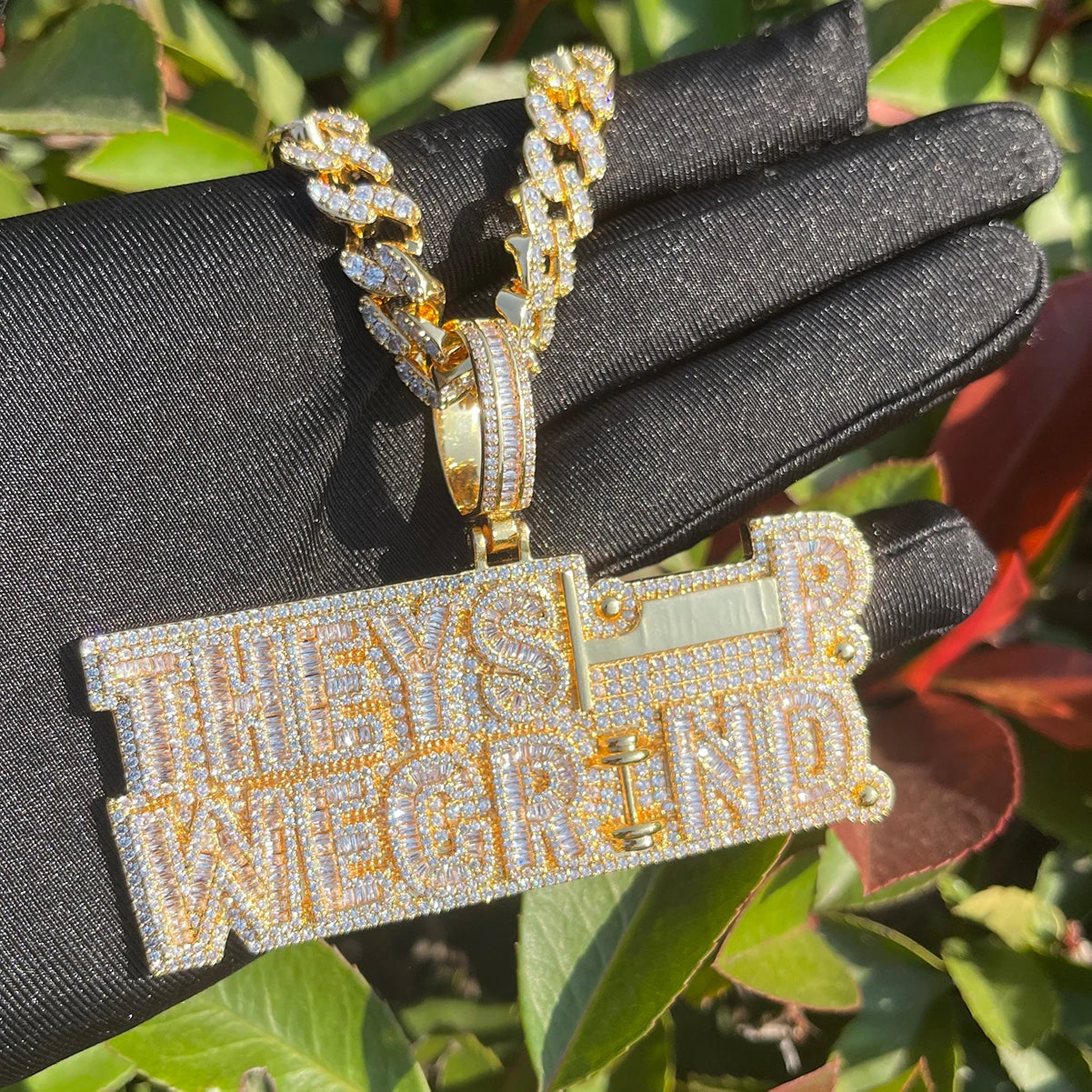 Bling "They Sleep We Grind" Pendant